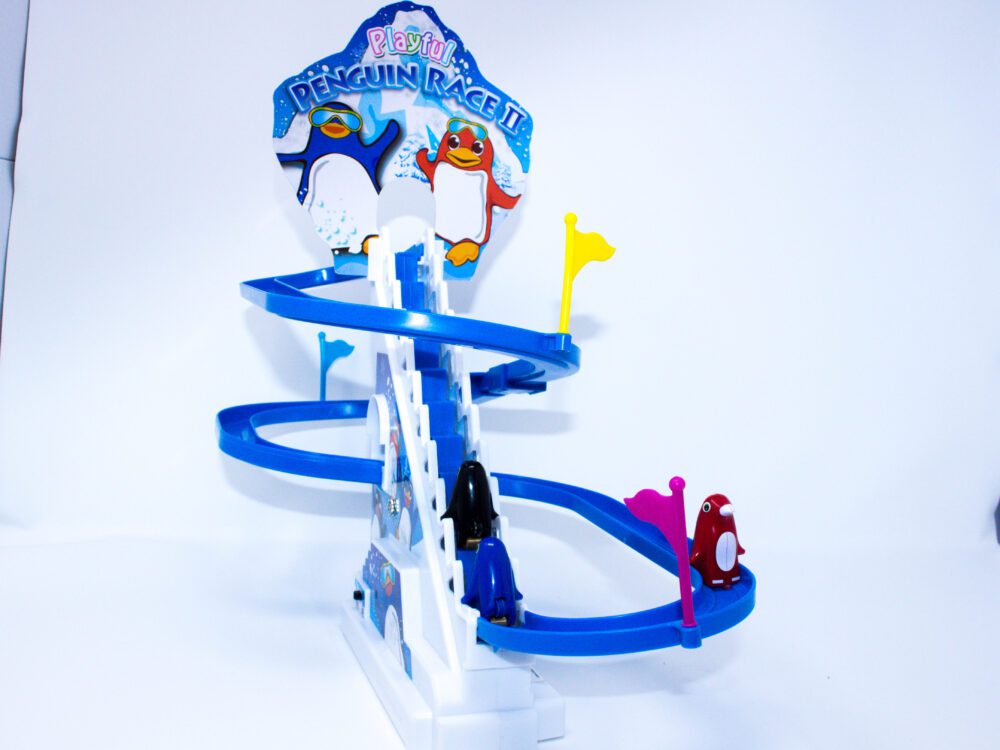 Penguin Roller Coaster Switch Adaptive Toy available in the lending library at FAAST.org