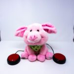 Step Up - Switch Adapted Toys - My Piggy Piper available in the lending library at FAAST.org