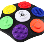 Plastic Hexagon with 6 buttons with different textures. Control panel in the middle of device.