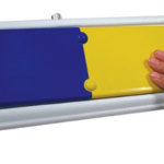 White rectangular base with blue and yellow buttons.