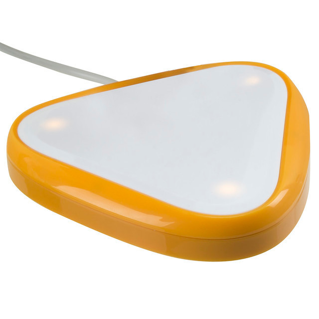 White plastic triangle with orange boarder